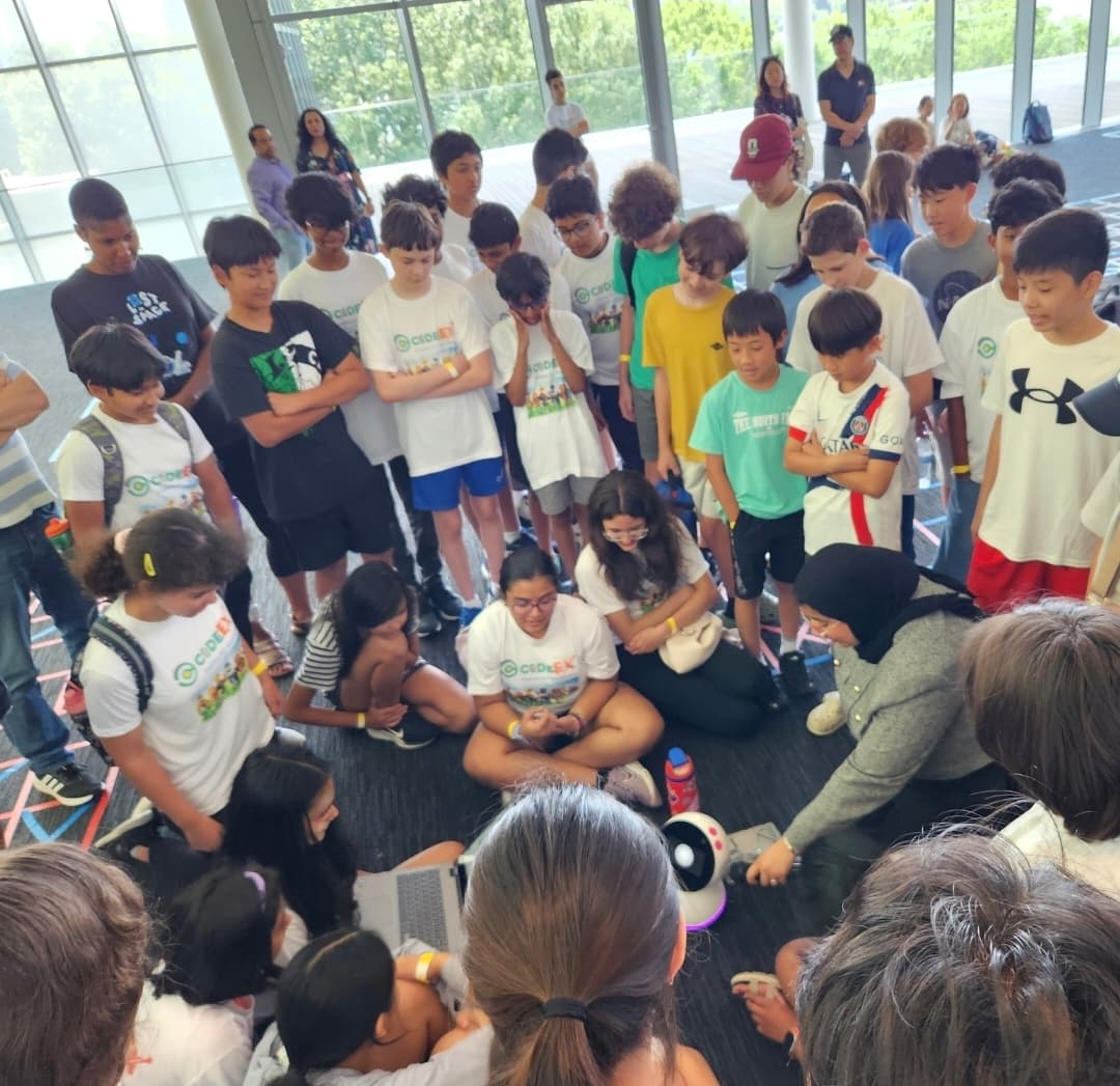Students collaborating during a robotics learning activity